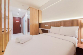 Comfy and Homey Studio at Sky House BSD Apartment By Travelio